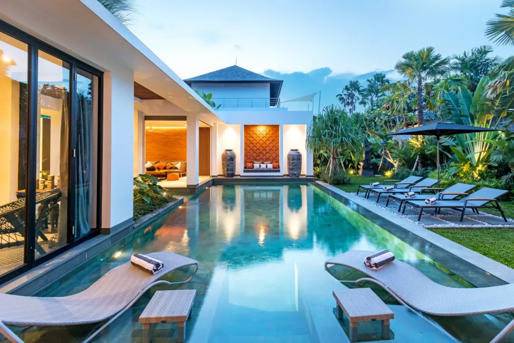 Villa Castil di Udara, Kerobokan — pool, terrace and open living pavilion at dusk, Villa Castil di Udara