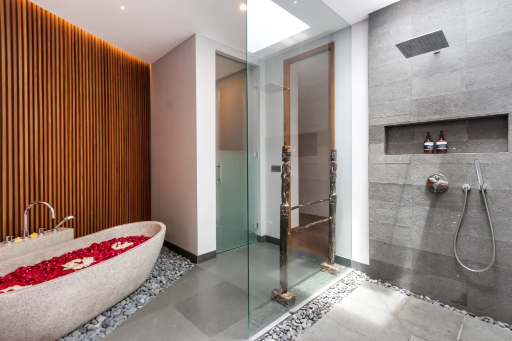 Villa Castil di Udara, Kerobokan — bathroom, freestanding stone soaking tub in an en-suite at Villa Castil di Udara