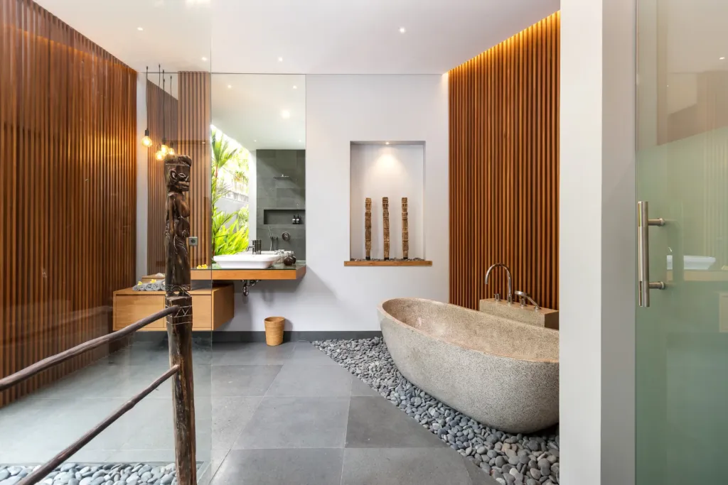 Villa Castil di Udara, Kerobokan — bathroom, stone basin in a slatted timber en-suite at Villa Castil di Udara