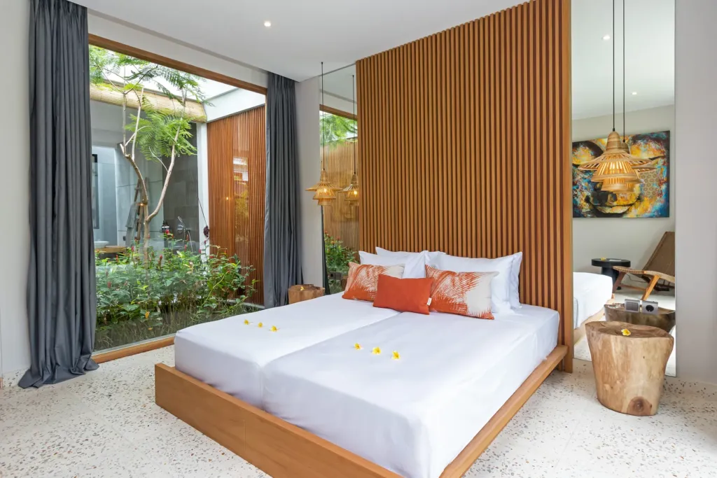Villa Castil di Udara, Kerobokan — bedroom, king bedroom at Villa Castil di Udara with doors onto a private courtyard