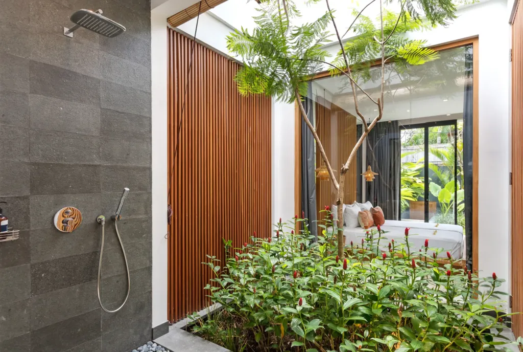 Villa Castil di Udara, Kerobokan — bathroom, beside a planted courtyard at Villa Castil di Udara