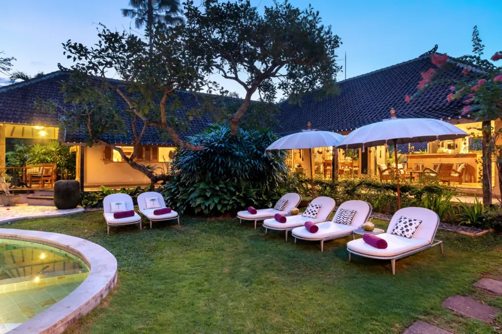 The lawn and living pavilion at Villa Koyama after dark