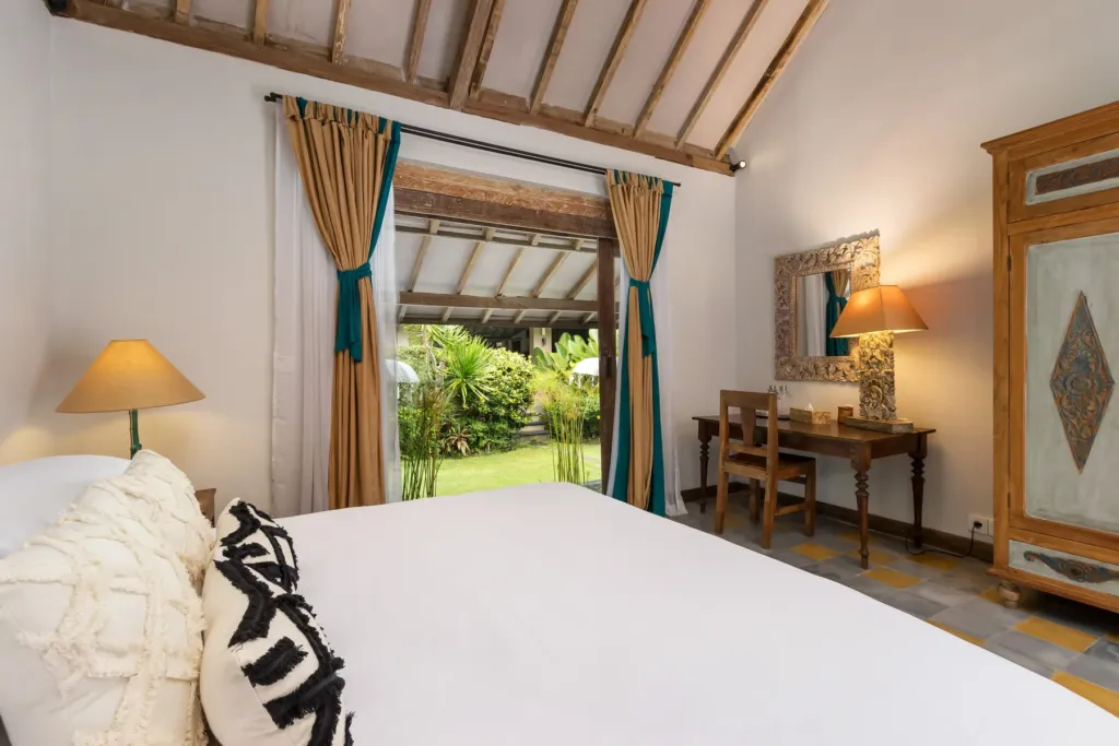 King bedroom at Villa Koyama with writing desk and painted timber wardrobe