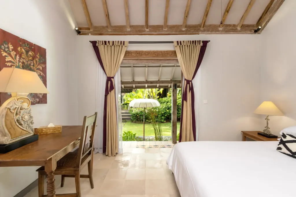 Bedroom at Villa Koyama looking out over the lawn and garden