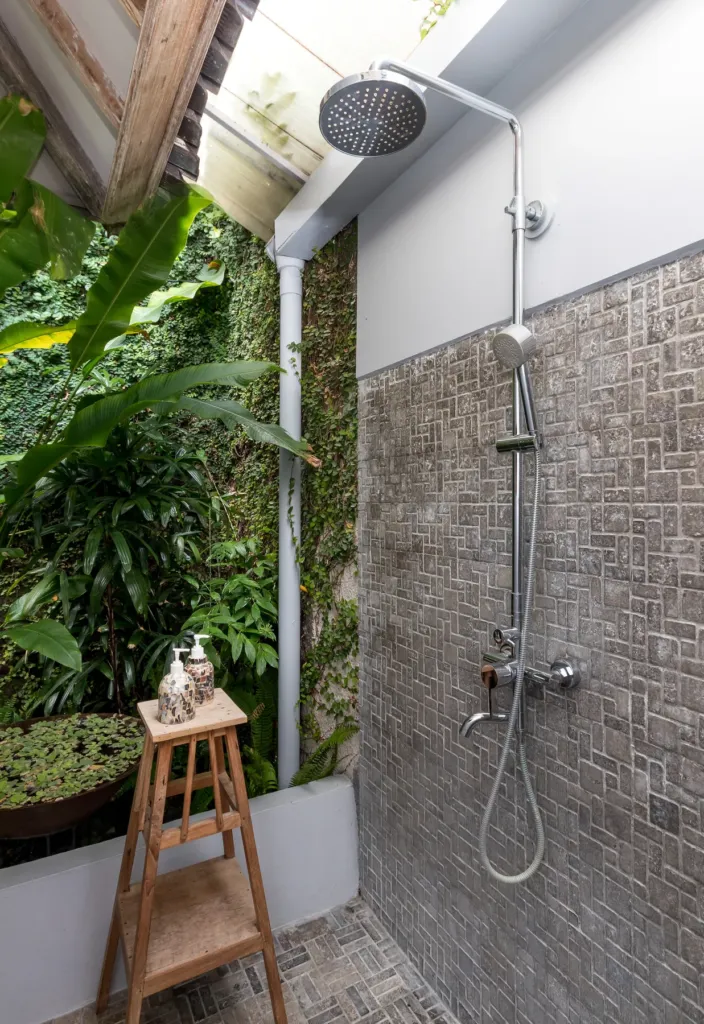 Outdoor shower in the twin room's private en-suite at Villa Koyama