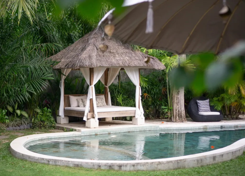 Thatched bale set beside the pool at Villa Koyama, Seminyak