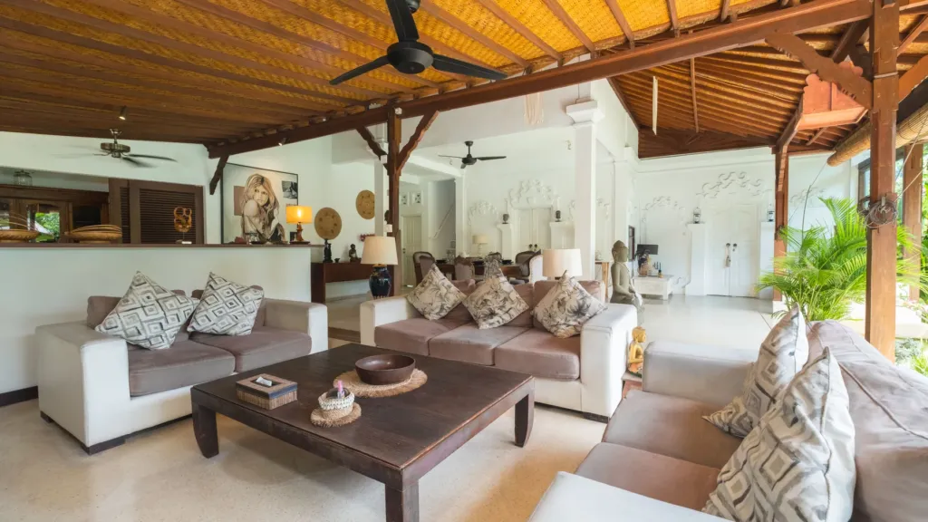 Villa Mogi, Seminyak — living room, deep sofas and ceiling fans in the living pavilion at Villa Mogi
