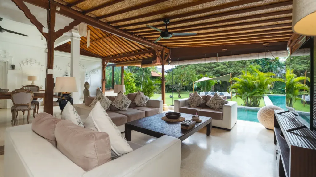 Villa Mogi, Seminyak — living room, villa Mogi looking out across the lawn to the pool
