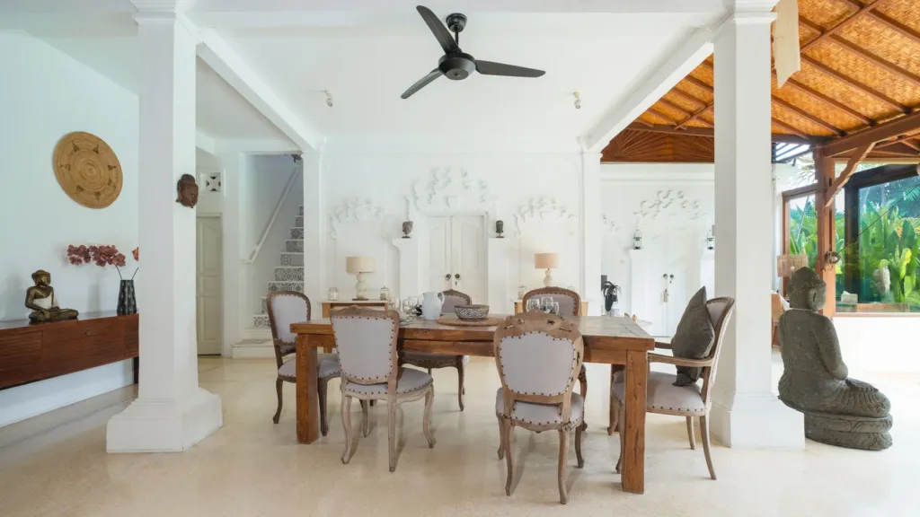 Villa Mogi, Seminyak — dining, enclosed dining room at Villa Mogi with a long timber table