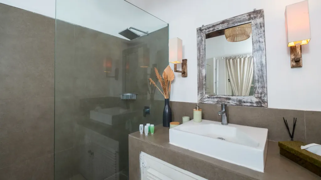 Villa Mogi, Seminyak — bathroom, villa Mogi with a glass walk-in shower and concrete vanity