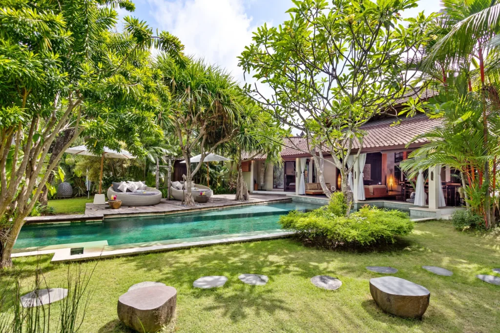 Lawn and stepping stones between the pavilions at Villa Shantika