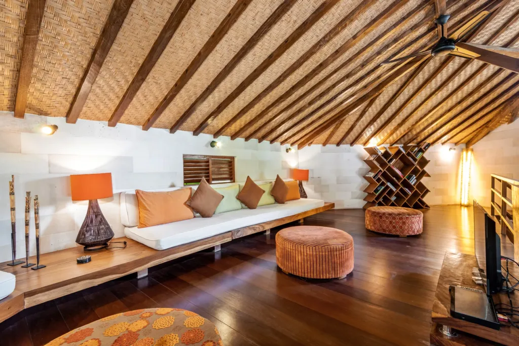 Upstairs mezzanine seating at Villa Shantika beneath the pitched roof
