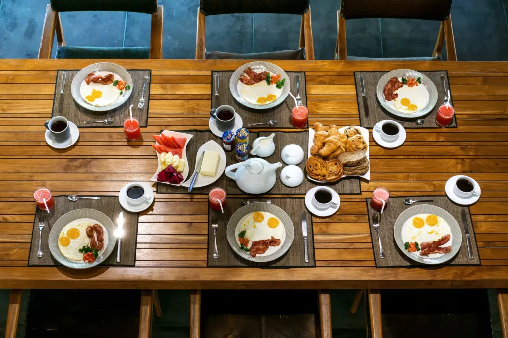 Breakfast laid out on the dining table at Villa Shantika
