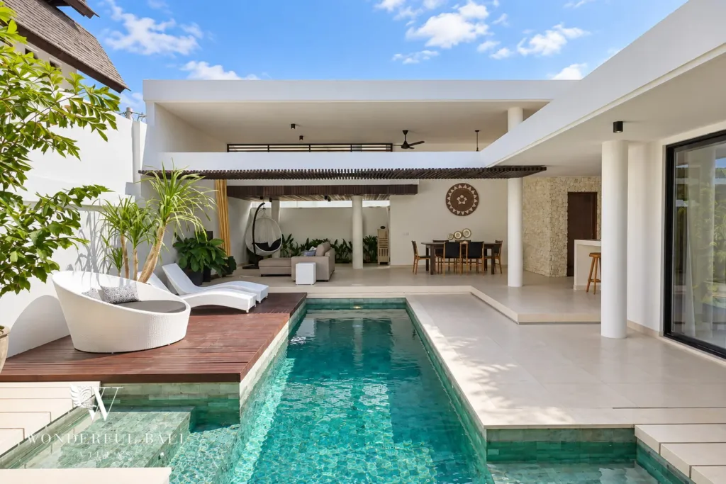 3BR villa in Berawa, Canggu, Bali — exterior, private pool courtyard with timber deck and sun loungers