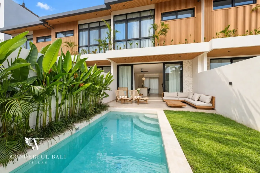 2BR villa for rent in Padonan, Canggu — brand-new two-storey tropical villa with a private pool, lawn and timber facade
