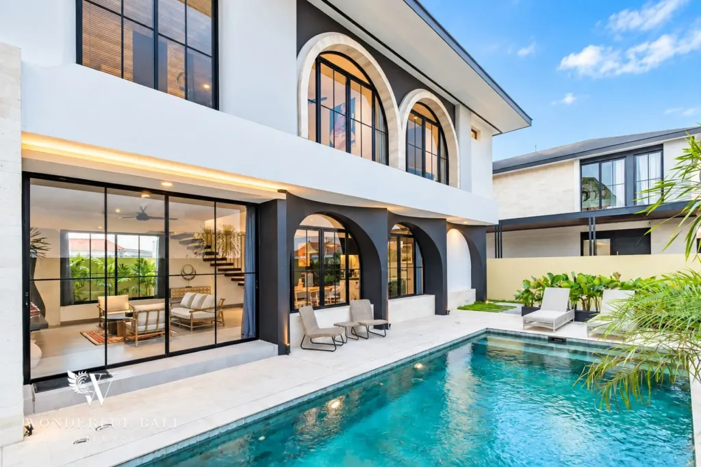 3BR villa for rent in Munggu — modern villa with arched windows and a long private pool near Seseh