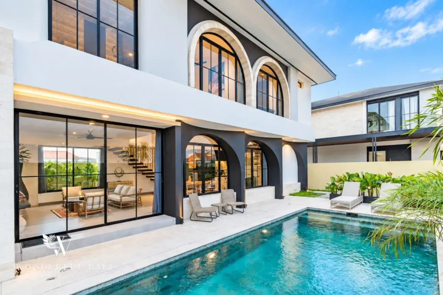3BR villa for rent in Munggu — modern villa with arched windows and a long private pool near Seseh