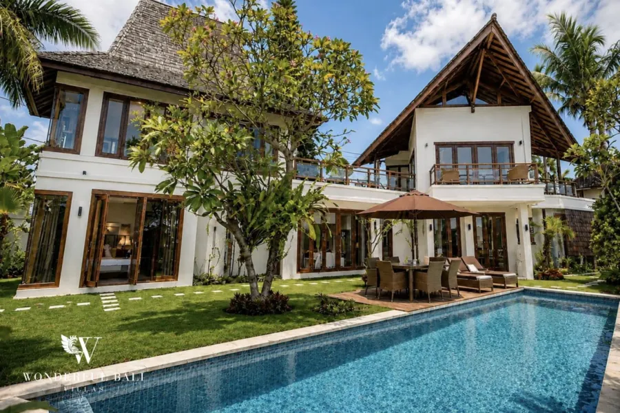4BR villa for rent in Padonan, Canggu — pool, 17 m pool along the garden with the villa behind