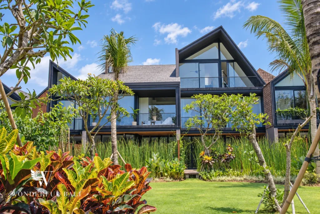 4BR villa for rent in Berawa, Canggu — exterior, gabled villa in a landscaped estate