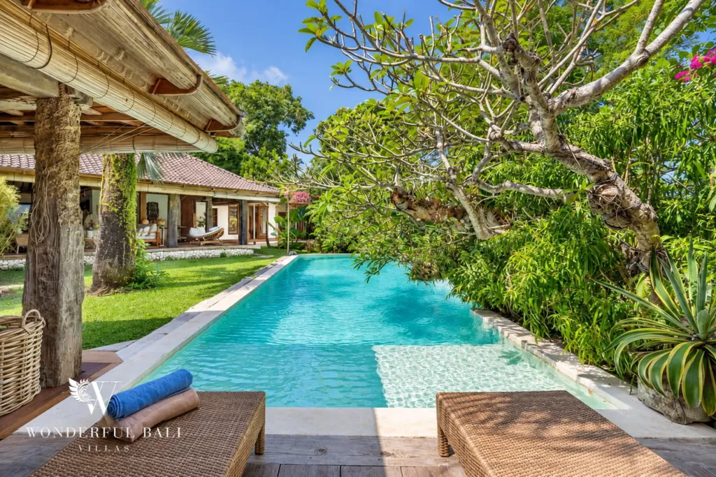 5BR villa for rent in Umalas — pool, long pool lined with frangipani trees and tropical planting
