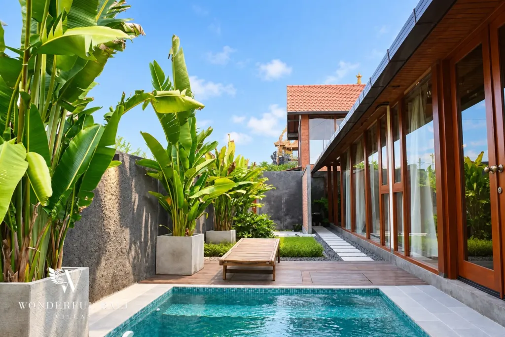 2BR villa for rent in Seseh — private pool with timber lounger and tropical planting