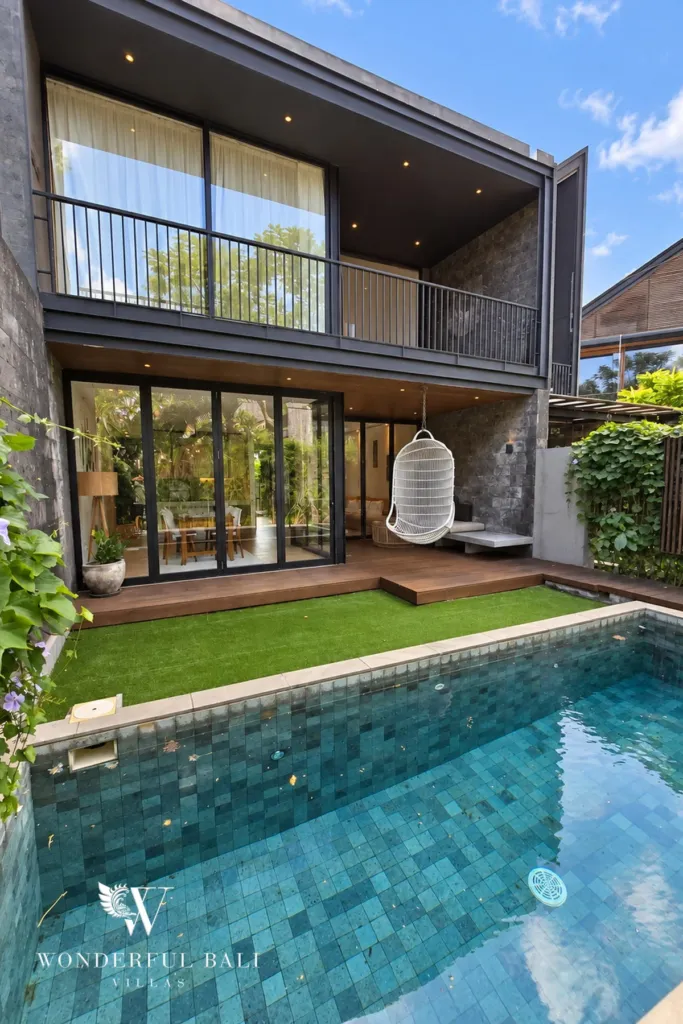 4BR villa for rent in Berawa, Canggu — pool, green-tiled private pool with lawn beside it