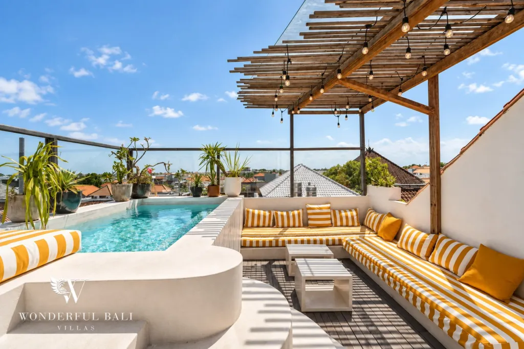 3BR villa for sale in Berawa — rooftop, rooftop jacuzzi beside a striped lounge under a pergola