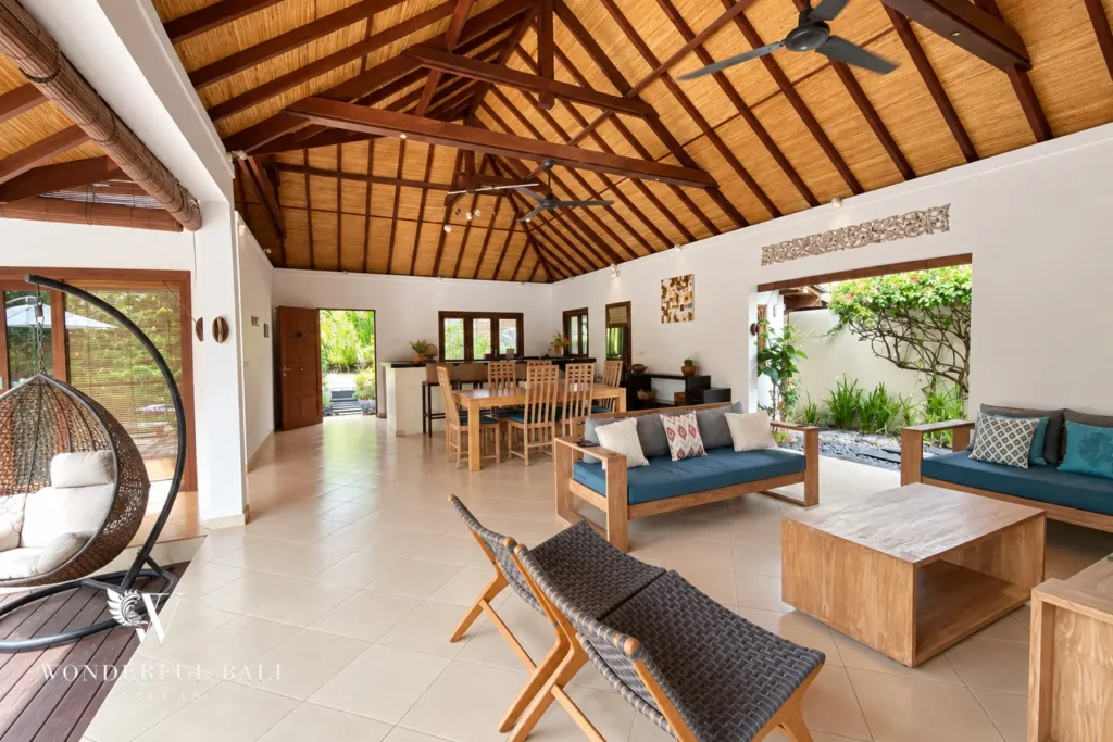 3BR villa for rent in Padonan, Canggu — living room, open-sided living pavilion under exposed timber rafters