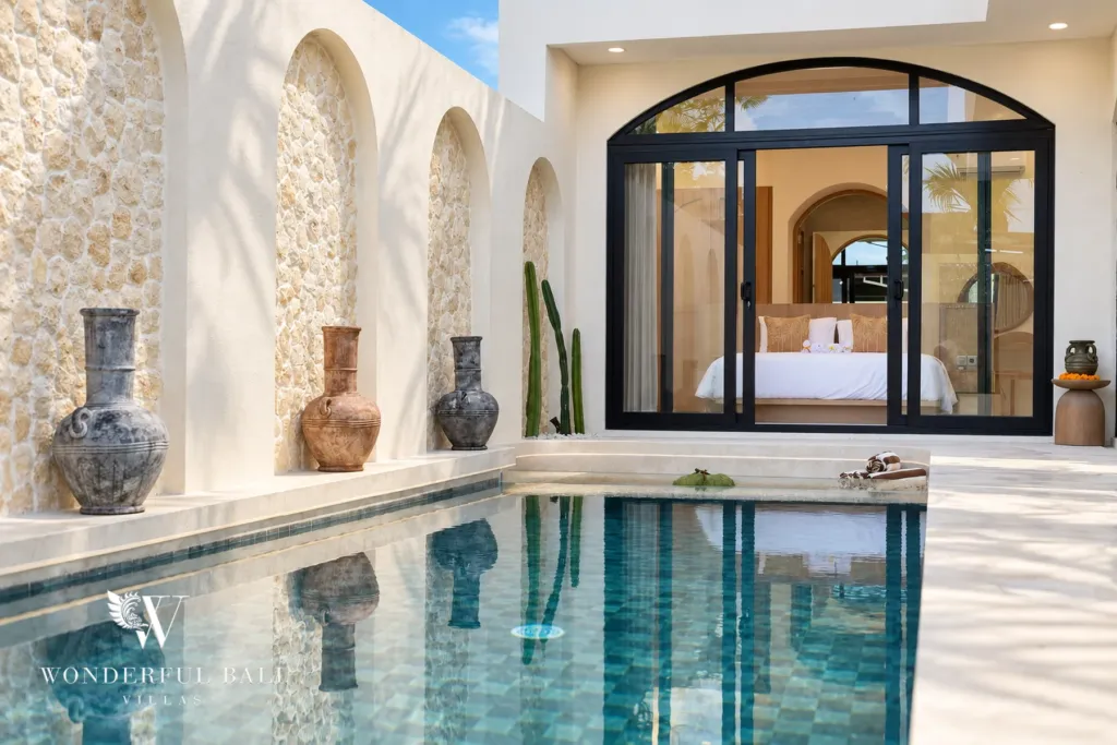 3BR villa for rent in Berawa, Canggu — pool, the pool looking back to the arched bedroom doors