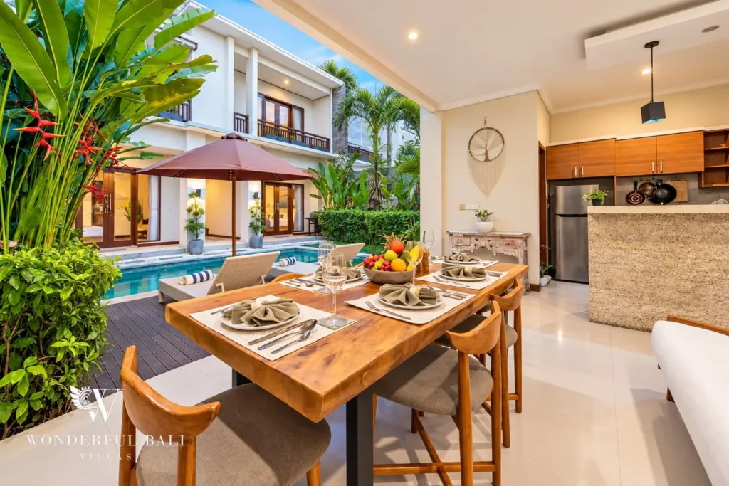 4BR villa for rent in Umalas, Bali — terrace, covered dining table on the terrace looking over the pool