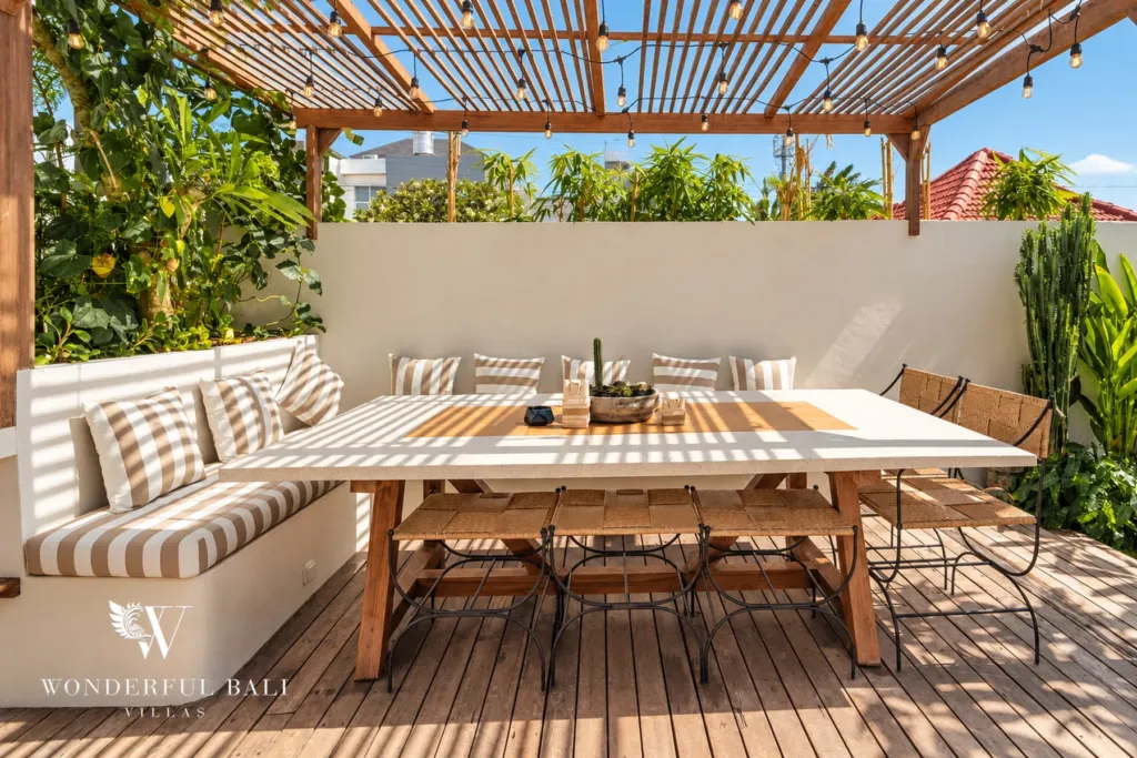 3BR villa for sale in Berawa — terrace, pergola-shaded dining table on a timber deck