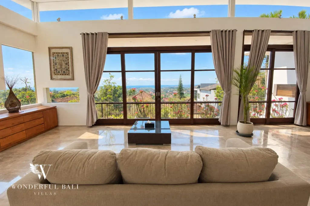 3BR villa for sale in Jimbaran — living room, upstairs living room with full-height sliding doors and sea views