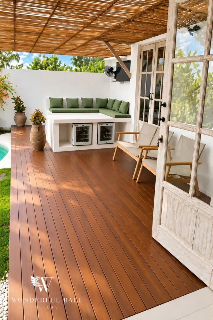 4BR villa for rent in Umalas, Bali — terrace, timber deck under a bamboo pergola with bench seating and drinks fridges