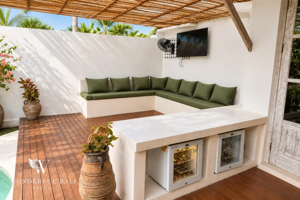 4BR villa for rent in Umalas, Bali — terrace, shaded lounge area on the deck beside the pool