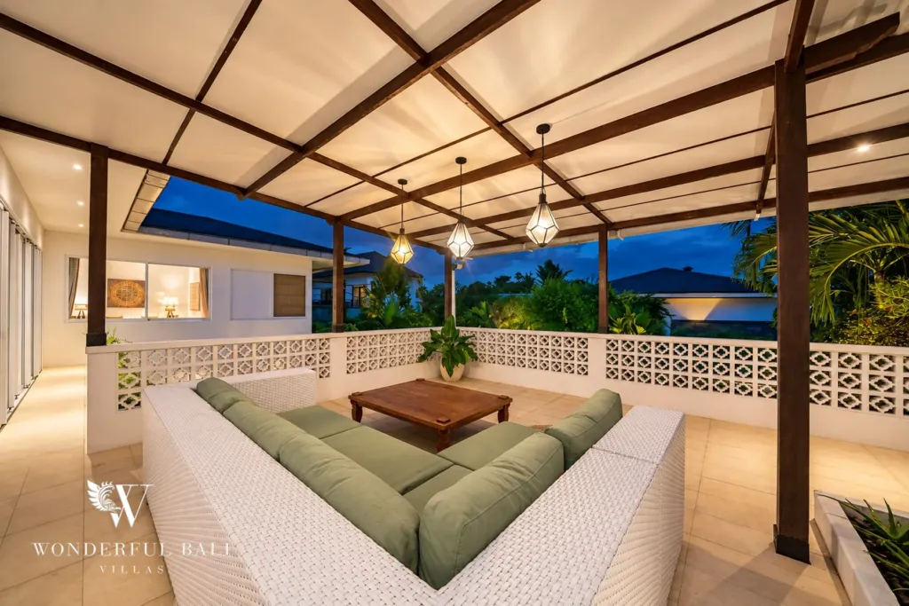 5BR villa for rent in Bumbak, Umalas — rooftop lounge, covered rooftop lounge with a pitched canopy and modular seating