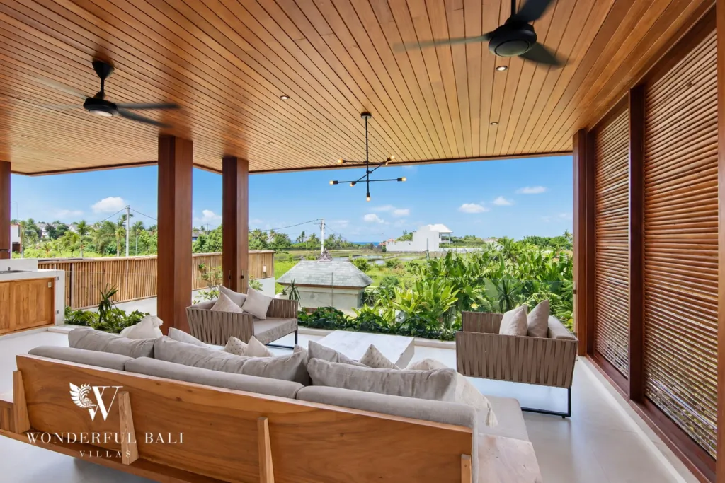 4BR villa for rent in Cemagi — upstairs lounge, covered lounge looking over rice fields to the ocean