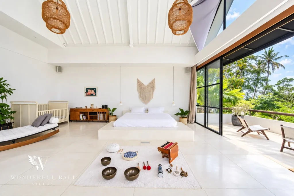 5BR villa for rent in Seseh, Bali — bedroom, master bedroom with a platform bed under a vaulted ceiling