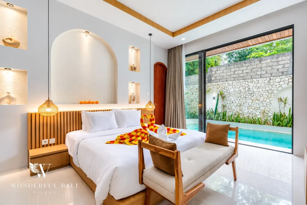 3BR villa for rent in Umalas, Bali — bedroom, ground-floor bedroom with sliding doors straight onto the pool