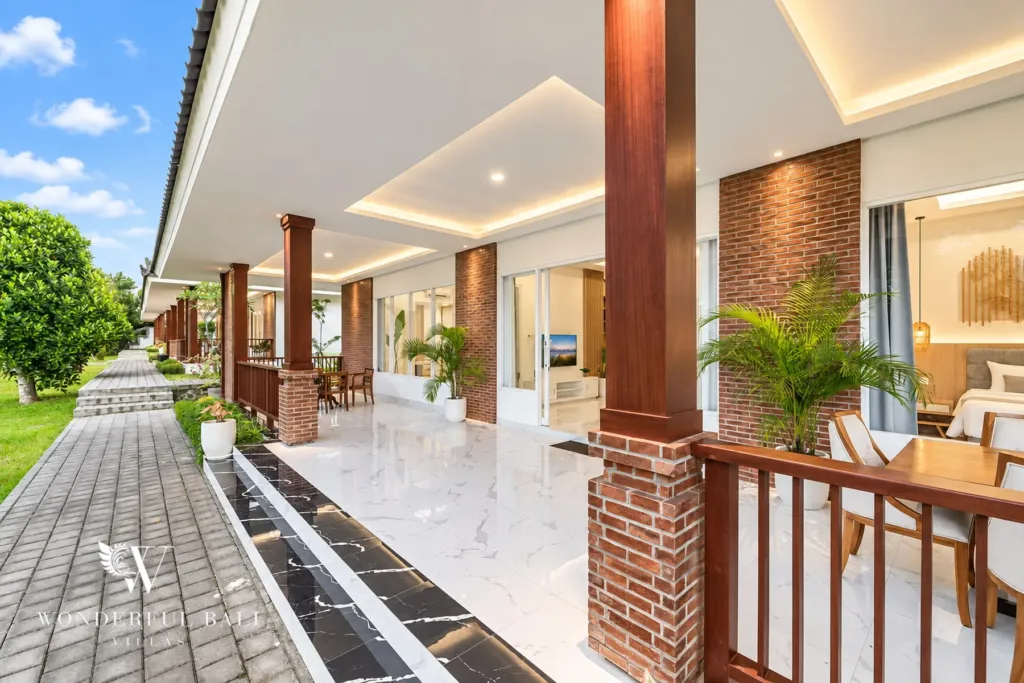 2BR villa for rent in Kaba-Kaba, Bali — terrace, the covered veranda lit at dusk