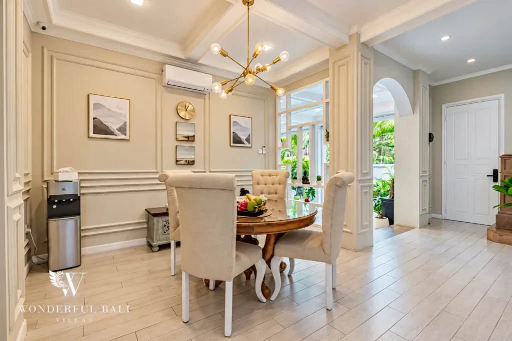 5BR villa for sale in Pererenan — dining room with panelled walls and an arched doorway