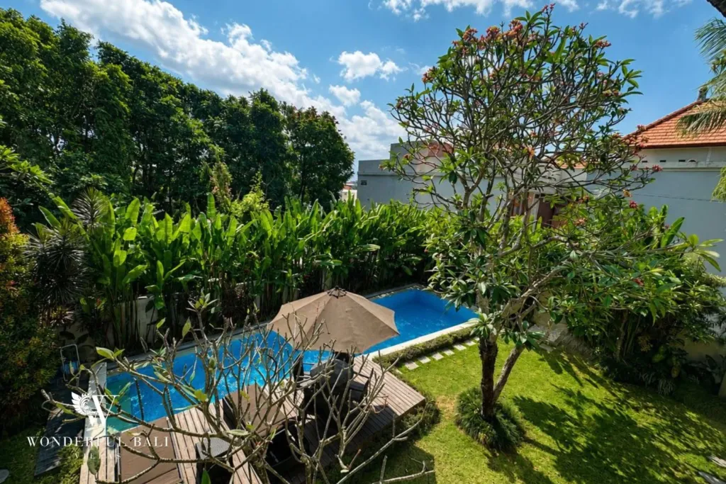 4BR villa for rent in Padonan, Canggu — garden, pool and lawn seen from above