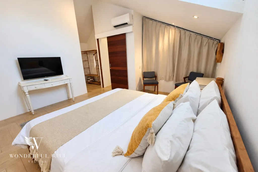 4BR villa for rent in Berawa, Canggu — bedroom, bedroom with a television and console