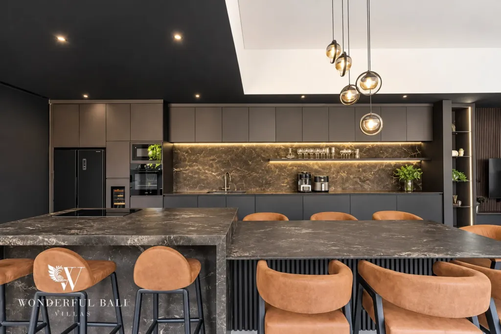 3br villa for sale umalas — breakfast bar and marble dining table with wine fridge and backlit stone splashback