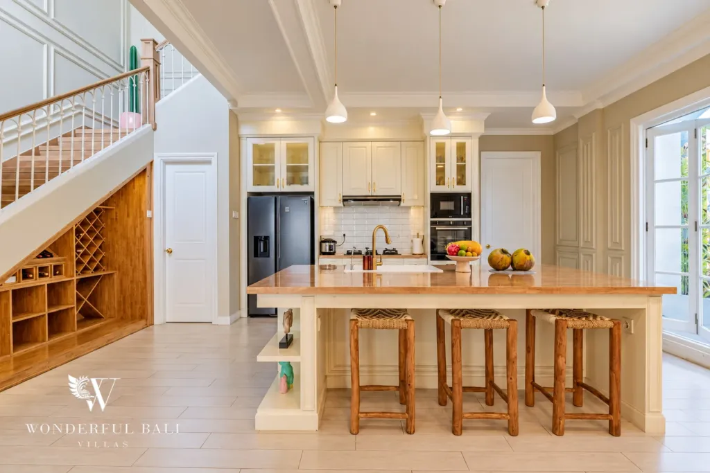 5BR villa for sale in Pererenan — long kitchen island with bar stools and pendant lights