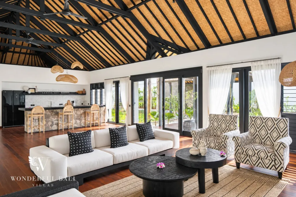 5BR villa for rent in Munggu, Bali — living room, living area looking through to the open kitchen and breakfast bar