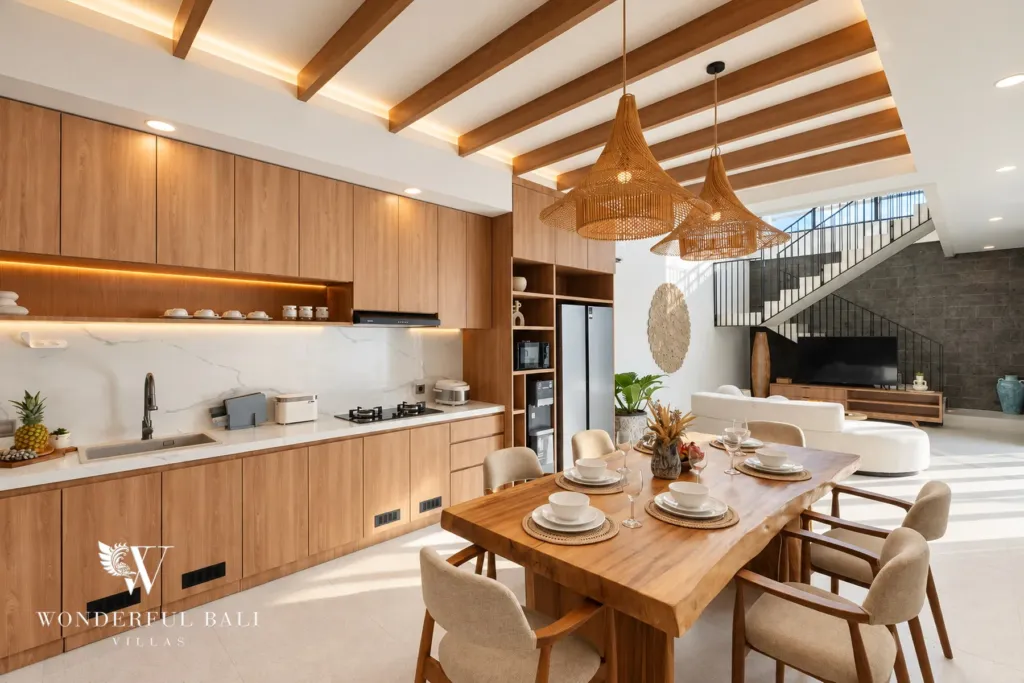 3BR villa for rent in Berawa, Canggu — kitchen, timber kitchen and dining table under a slatted ceiling