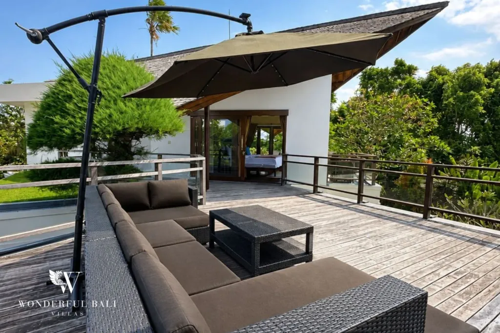 4BR villa for rent in Padonan, Canggu — terrace, raised deck with a sofa and mountain views