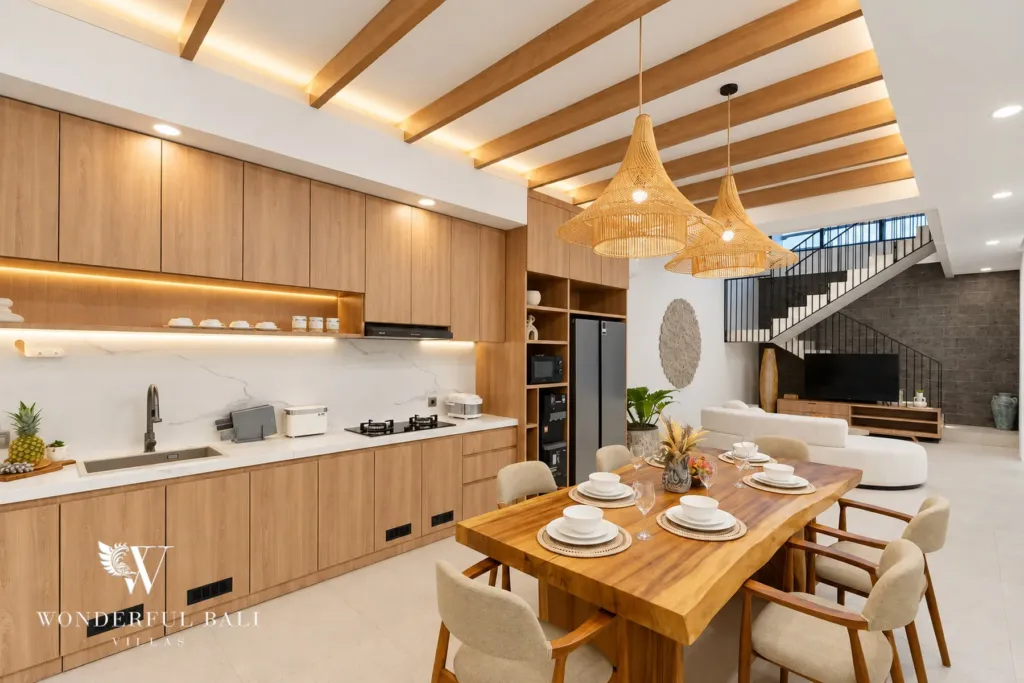 3BR villa for rent in Berawa, Canggu — kitchen, the kitchen run and dining table from the living side