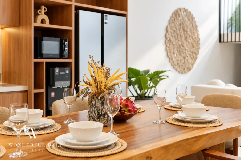 3BR villa for rent in Berawa, Canggu — living room, dining table laid for six
