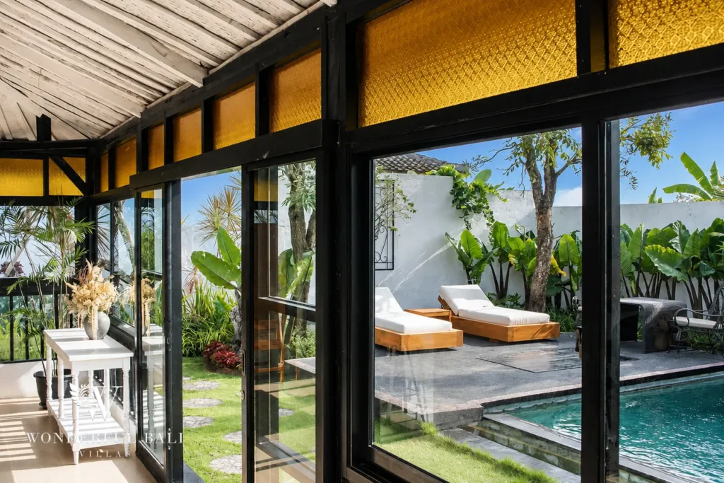 3BR villa for rent in Berawa, Canggu — living room, covered lounge beside the pool